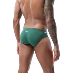 hot gay man in dark blue Gay Swimwear | Men's Bold Bowtie Swim Briefs- pridevoyageshop.com - gay men’s underwear and swimwear