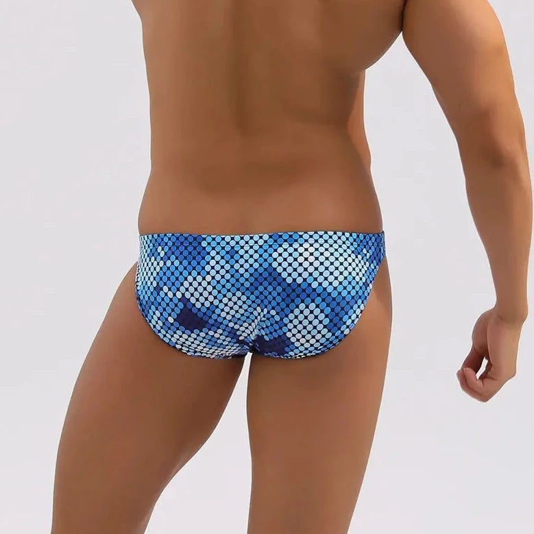 a sexy gay man in blue Men's Skinny Aqua Optix Swim Briefs - pridevoyageshop.com - gay men’s underwear and swimwear