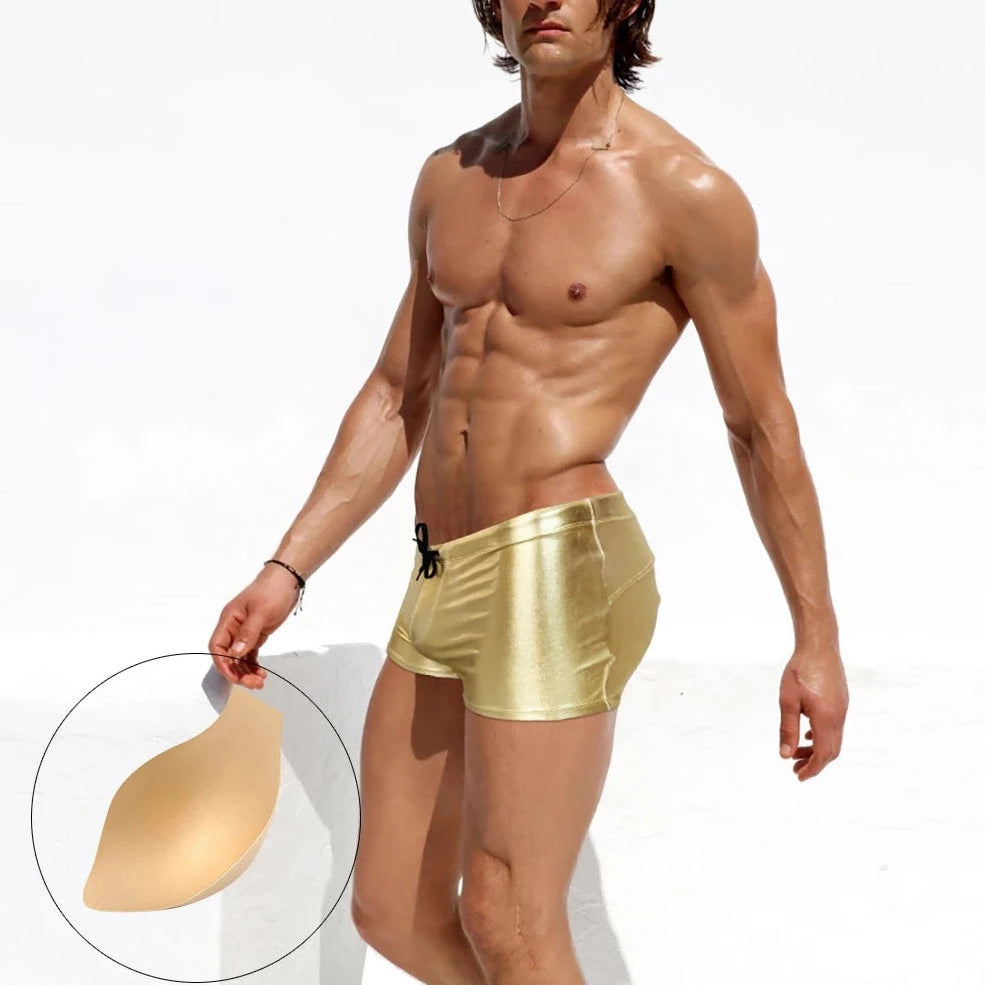 a sexy gay man in gold Men's Liquid Metallic Swim Trunks - pridevoyageshop.com - gay men’s underwear and swimwear