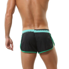 hot gay man in black Seobean Mens Gym Shorts With Built In Jockstrap | Gay Shorts - Men's Activewear, gym short, sport shorts, running shorts- pridevoyageshop.com