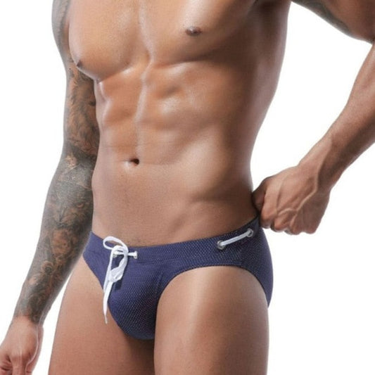 hot gay man in dark blue Gay Swimwear | Men's Bold Bowtie Swim Briefs- pridevoyageshop.com - gay men’s underwear and swimwear