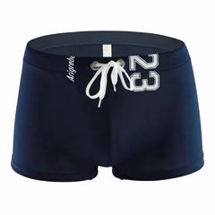 blue Men's 23 Bowtie Swim Trunks - pridevoyageshop.com - gay men’s underwear and swimwear