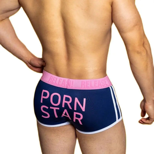 a sexy gay man in navy DM Porn Star Pride Boxer Briefs - pridevoyageshop.com - gay men’s underwear and swimwear