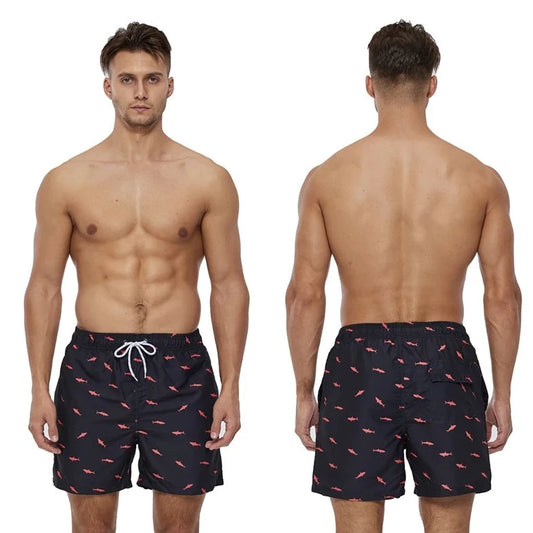 a hot gay man in Red Chili Board Shorts - pridevoyageshop.com - gay men’s underwear and swimwear