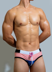 sexy gay man in pink Gay Swimwear | DM Laced Swim Briefs- pridevoyageshop.com - gay men’s underwear and swimwear