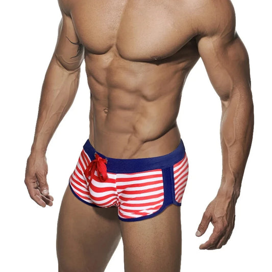 a hot gay man in red Mariner Stripe Swim Trunks - pridevoyageshop.com - gay men’s underwear and swimwear