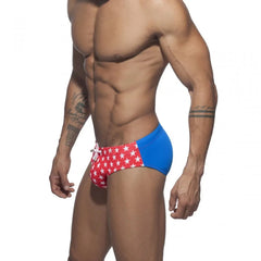 a hot gay man in red Men's Bowtie Stars Swim Briefs - pridevoyageshop.com - gay men’s underwear and swimwear
