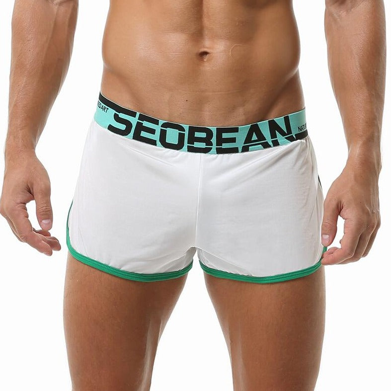 hot gay man in white Seobean Mens Gym Shorts With Built In Jockstrap | Gay Shorts - Men's Activewear, gym short, sport shorts, running shorts- pridevoyageshop.com