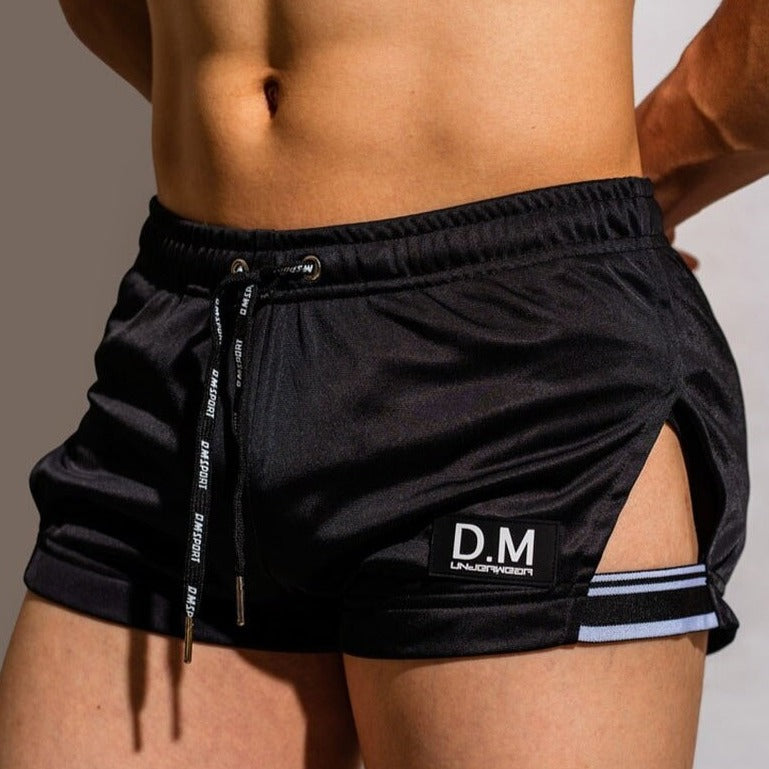 sexy gay man in black Gay Shorts | DM Side Show Gym Shorts - Men's Activewear, gym short, sport shorts, running shorts- pridevoyageshop.com