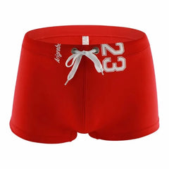 red Men's 23 Bowtie Swim Trunks - pridevoyageshop.com - gay men’s underwear and swimwear