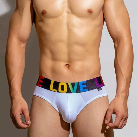 a hot gay man in white DM Rainbow Pride Love Briefs - pridevoyageshop.com - gay men’s underwear and swimwear