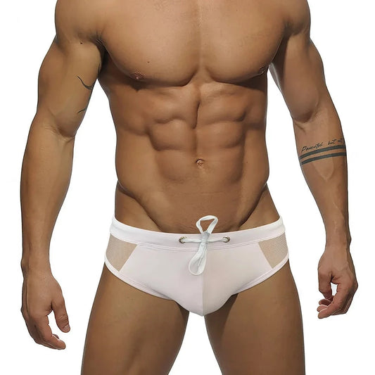 a sexy gay man in white Men's Sideshow Mesh Swim Briefs - pridevoyageshop.com - gay men’s underwear and swimwear