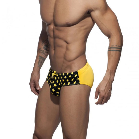 a hot gay man in black Men's Bowtie Stars Swim Briefs - pridevoyageshop.com - gay men’s underwear and swimwear