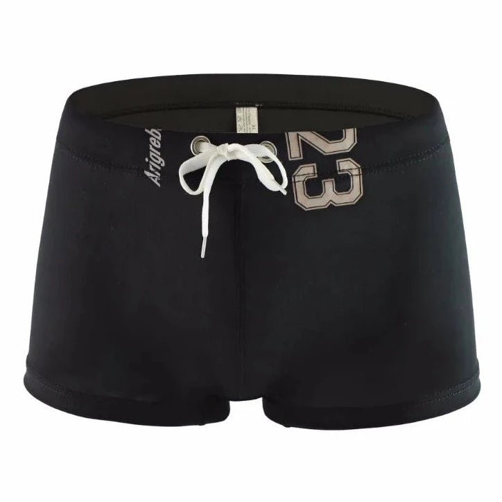 black Men's 23 Bowtie Swim Trunks - pridevoyageshop.com - gay men’s underwear and swimwear