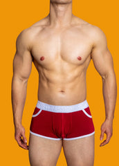 a sexy gay man in burgundy DM Porn Star Pride Boxer Briefs - pridevoyageshop.com - gay men’s underwear and swimwear