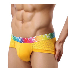 a hot man in yellow Gay Men's Rainbow Band Mesh Briefs - pridevoyageshop.com - gay men’s underwear and swimwear