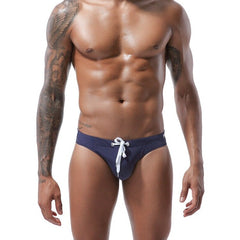 hot gay man in dark blue Gay Swimwear | Men's Bold Bowtie Swim Briefs- pridevoyageshop.com - gay men’s underwear and swimwear