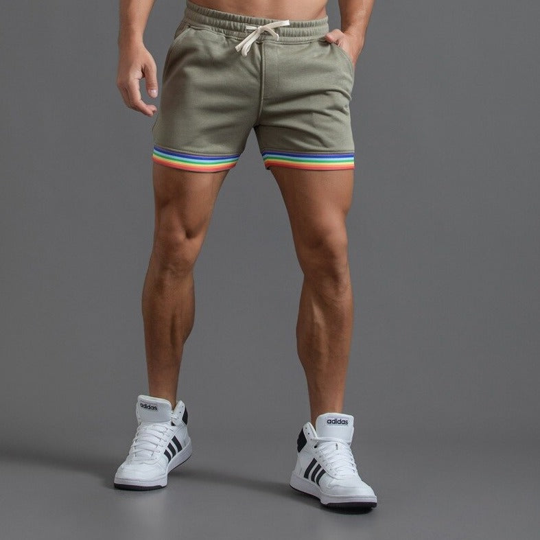 sexy gay man in gray green Men's Rainbow Gym Shorts with Pockets | Gay Shorts - Men's Activewear, gym short, sport shorts, running shorts- pridevoyageshop.com
