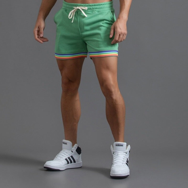 sexy gay man in green Men's Rainbow Gym Shorts with Pockets | Gay Shorts - Men's Activewear, gym short, sport shorts, running shorts- pridevoyageshop.com