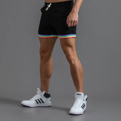 sexy gay man in black Men's Rainbow Gym Shorts with Pockets | Gay Shorts - Men's Activewear, gym short, sport shorts, running shorts- pridevoyageshop.com