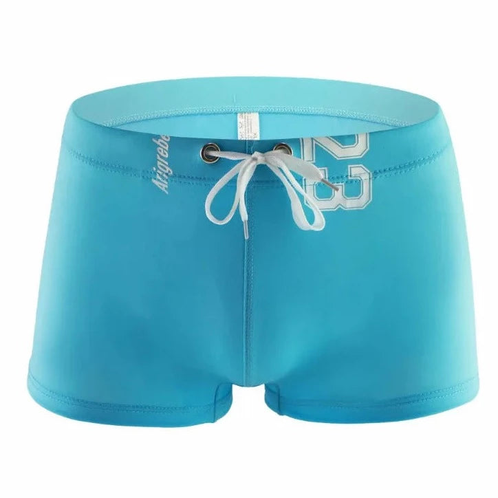 sky blue Men's 23 Bowtie Swim Trunks - pridevoyageshop.com - gay men’s underwear and swimwear