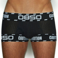 front of a man in Black OBSO Men's Low Rise Boxer Briefs Underwear - pridevoyageshop.com - gay men’s underwear and swimwear
