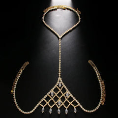 a flat lay of Gold Chelsea Showboy Crystal Body Chain - pridevoyageshop.com - gay men's harness, fetish gear, rave outfit