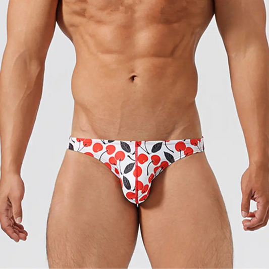 a hot man in Men’s Cherry Poppin’ Swim Briefs - pridevoyageshop.com - gay men’s sexy swim briefs, trunks, board shorts, and bikinis