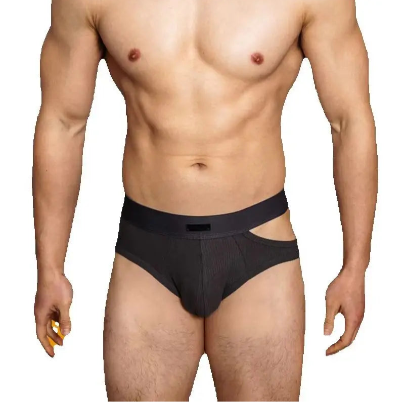 a hot man in black DM Men’s “Side-Slit” Cutout Brief - pridevoyageshop.com - gay men’s thongs, boxers, briefs and jockstraps