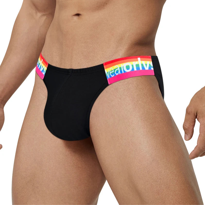 a hot man in black Men’s Rainbow Strapped Bulge Brief - pridevoyageshop.com - gay men’s thongs, boxers, briefs and jockstraps