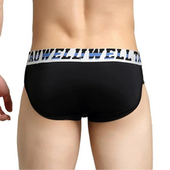 a hot man in black TAUWELL Men’s “Strap & Sizzle” Low-Rise Brief - pridevoyageshop.com - gay men’s thongs, boxers, briefs and jockstraps