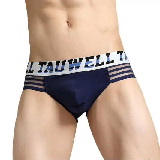 a hot man in dark blue TAUWELL Men’s “Strap & Sizzle” Low-Rise Brief - pridevoyageshop.com - gay men’s thongs, boxers, briefs and jockstraps