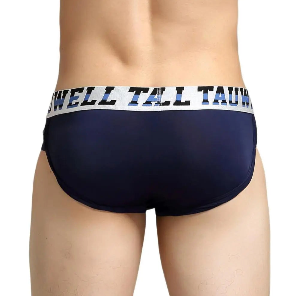 a hot man in dark blue TAUWELL Men’s “Strap & Sizzle” Low-Rise Brief - pridevoyageshop.com - gay men’s thongs, boxers, briefs and jockstraps