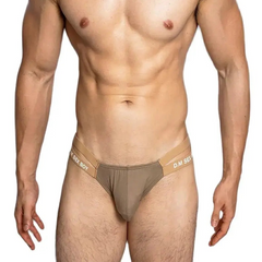 a sexy man in Champagne DM Men’s “Sex Boy” Side-Strap Brief - pridevoyageshop.com - gay men’s thongs, boxers, briefs and jockstraps