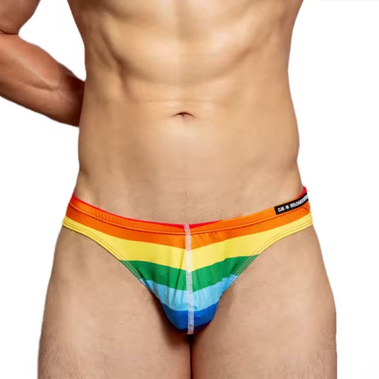 a sexy man in DESMIIT LGBT Rainbow Swim Briefs - pridevoyageshop.com - gay men’s sexy swim briefs, trunks, board shorts, and bikinis