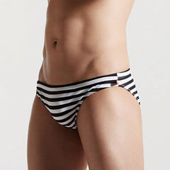 a sexy man in Desmiit Men’s Cellblock Sweetheart Low Rise Swim Briefs - pridevoyageshop.com - gay men’s sexy swim briefs, trunks, board shorts, and bikinis