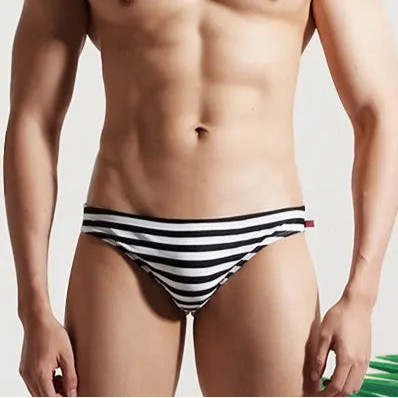 a sexy man in Desmiit Men’s Cellblock Sweetheart Low Rise Swim Briefs - pridevoyageshop.com - gay men’s sexy swim briefs, trunks, board shorts, and bikinis