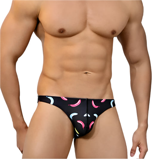 a sexy man in Men’s Big Banana Energy Swim Briefs - pridevoyageshop.com - gay men’s sexy swim briefs, trunks, board shorts, and bikinis