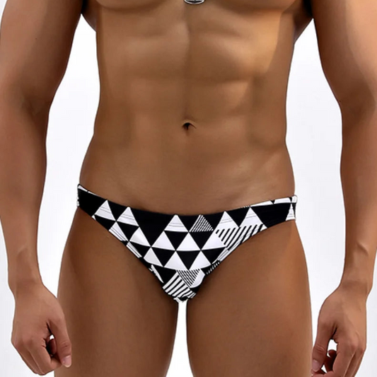 a sexy man in Men’s Black & Bi Swim Briefs - pridevoyageshop.com - gay men’s sexy swim briefs, trunks, board shorts, and bikinis