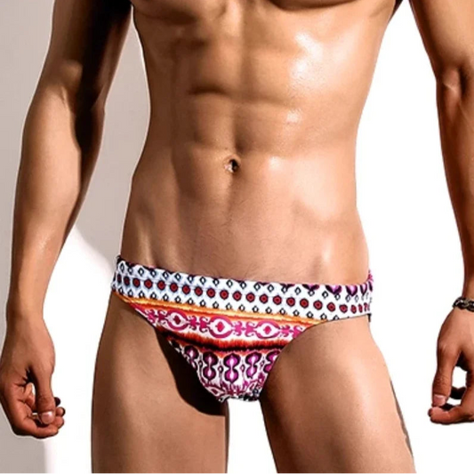 a sexy man in Men’s Boho Heatwave Swim Briefs - pridevoyageshop.com - gay men’s sexy swim briefs, trunks, board shorts, and bikinis