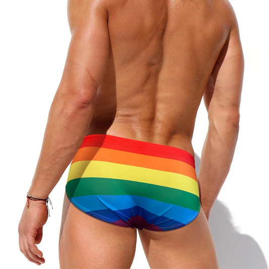 a sexy man in Men's Bottom of the Rainbow Swim Briefs - pridevoyageshop.com - gay men’s sexy swim briefs, trunks, board shorts, and bikinis
