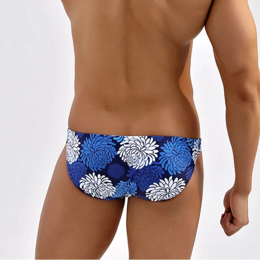 a sexy man in Men’s Chrysanthemum Tease Swim Briefs - pridevoyageshop.com - gay men’s sexy swim briefs, trunks, board shorts, and bikinis