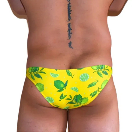 a sexy man in Men’s Citrus Sizzle Swim Bikini Briefs - pridevoyageshop.com - gay men’s sexy swim briefs, trunks, board shorts, and bikinis