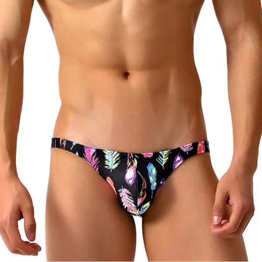 a sexy man in Men’s Colorful Feather Skinny Swim Briefs - pridevoyageshop.com - gay men’s sexy swim briefs, trunks, board shorts, and bikinis