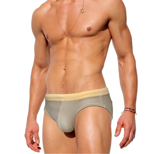a sexy man in Men’s Creamy Dream Nude Swim Briefs - pridevoyageshop.com - gay men’s sexy swim briefs, trunks, board shorts, and bikinis