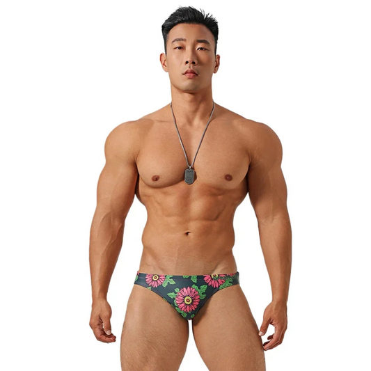 a sexy man in Men’s Daisy Dare Swim Bikini Briefs - pridevoyageshop.com - gay men’s sexy swim briefs, trunks, board shorts, and bikinis