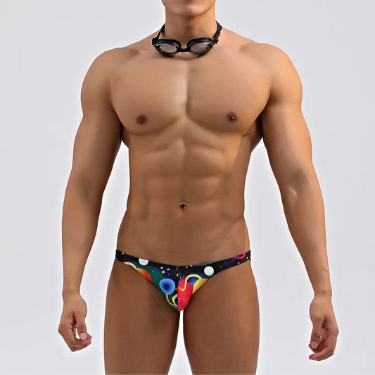 a sexy man in Men’s Galaxy Glaze Swim Briefs - pridevoyageshop.com - gay men’s sexy swim briefs, trunks, board shorts, and bikinis