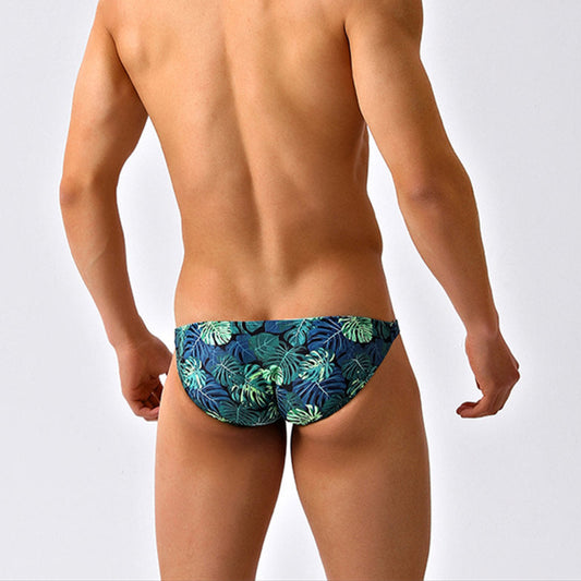 a sexy man in Men’s Hung in the Jungle Skinny Swim Briefs - pridevoyageshop.com - gay men’s sexy swim briefs, trunks, board shorts, and bikinis