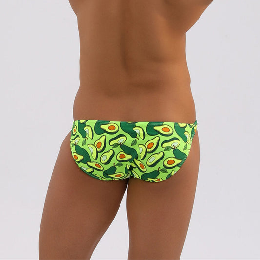 A sexy man in Men’s Juicy Avocado Mini Swim Briefs - pridevoyageshop.com - gay men’s sexy swim briefs, trunks, board shorts, and bikinis