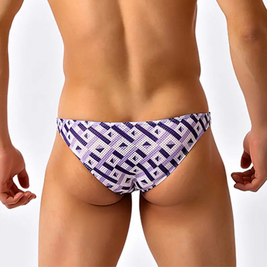 a sexy man in Men’s Mesh Matrix Bikini Swim Briefs - pridevoyageshop.com - gay men’s sexy swim briefs, trunks, board shorts, and bikinis